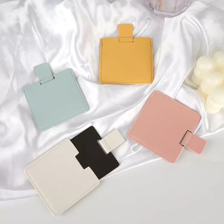 Kreditu-txartelaren tamainako poltsikoko ispilua